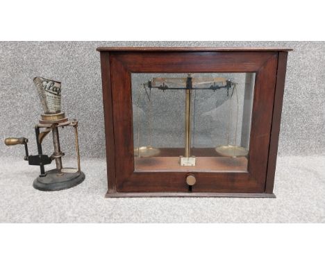 A 19th century Griffin &amp; Tatlock set of brass scales in a glazed mahogany case (incomplete), along with an unusual late 1