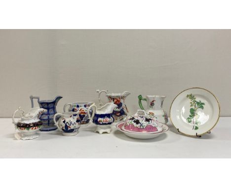 A collection of 19th century porcelain to include seven Gaudy Welsh and other hand painted jugs along with a hand painted Swa