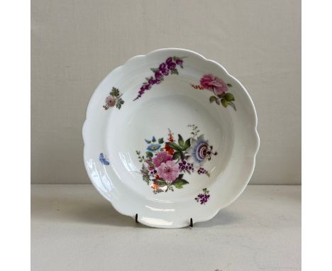 A rare early 19th century lobed porcelain Nantgarw dish hand painted by or under the influence of Thomas Pardoe with a cluste
