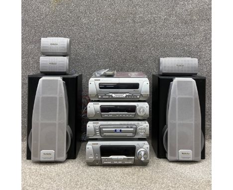 A Technics DV290 stereo hi-fi system complete with a tuner/amplifier, DVD/CD changer, sound processor and a double cassette d