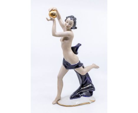 Goldscheider figure of female draped in blue cloth with golden orb in her hands. Height approx 30cm. Marks to the base. No si