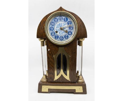 A lovely arts & crafts mantel clock with Le Ray Feys 2 train spring driven movement chiming on a gong. Lovely ceramic blue 4 