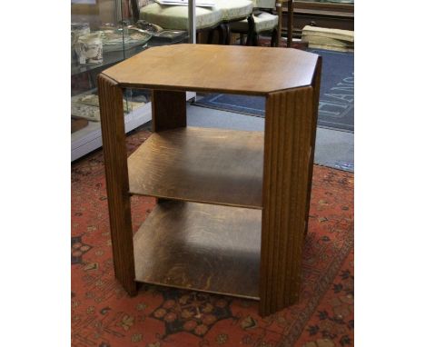 A wooden Art Deco occasional table of hexagonal form with central shelf. Size approx 54cm high, top size 45.5cm square.