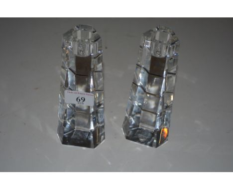 A pair of Orrefors glass candlesticks