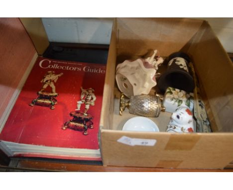 A box containing a Royal Crown Derby seal; a Royal Crown figurine 'Ballad Seller'; a Wedgewood Jasperware vase; a 1970s fan A