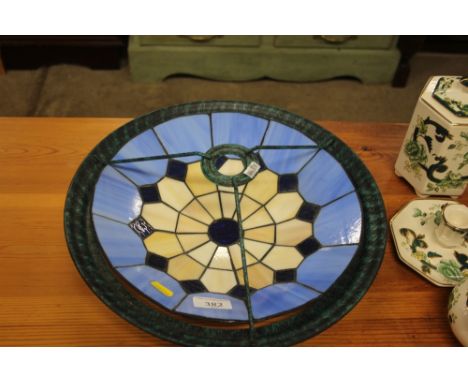 A Tiffany style light shade; and two novelty lamps 