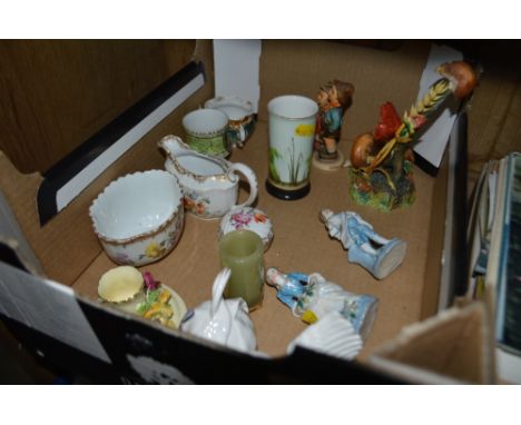 A tray of small china ornaments to include a Goebel figure group 
