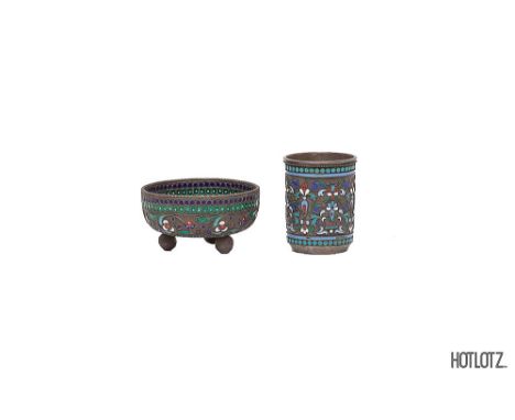 A RUSSIAN SIVER AND CLOISONNE ENAMEL VODKA CUP AND SMALL BOWL
The vodka cup decorated in coloured enamels with stylised folia