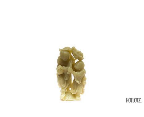A CHINESE JADE FIGURAL GROUP
15cm high x 6.5cm deep x 9cm long
Provenance: From the Collection of Dato' Jannie Chan
Notes: 1 