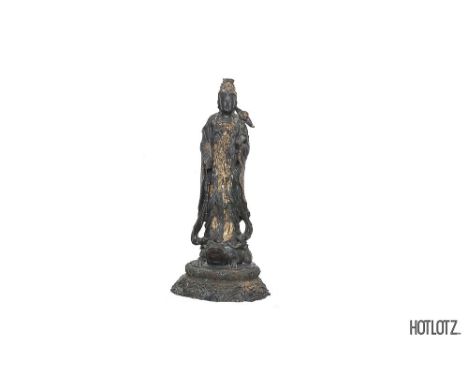 A LARGE CHINESE BRONZE STATUE OF GUANYIN
Modelled standing on a frog
104cm high, 58cm diameter
Provenance: From the Collectio