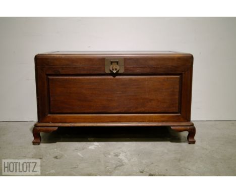 A CAMPHOR LINED ORIENTAL TRUNK ON STAND
60.5cm high x 103cm wide x 53cm deep
Provenance: From the Collection of Dato Jannie C