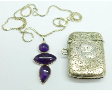 A silver and amethyst pendant and chain and a silver vesta case, case a/f 
