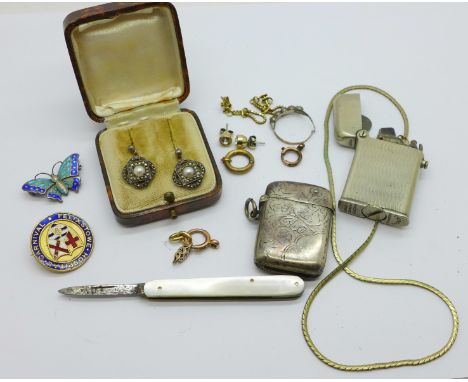 A silver vesta case, a pair of marcasite and pearl earrings, a silver and enamel butterfly brooch by Charles Horner, enamel a