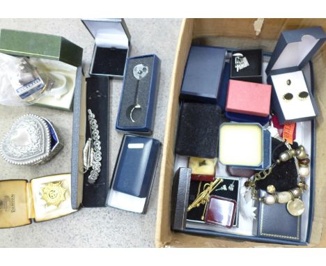 Costume jewellery, a Coronation 'Litbadge', three silver thimbles, a metal core bangle, a trinket box and a military badge 