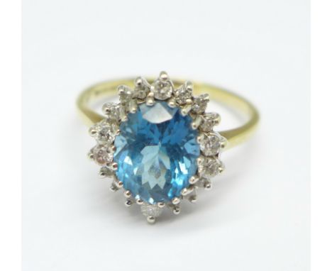 A 9ct gold, blue stone and diamond cluster ring, 3.8g, R 