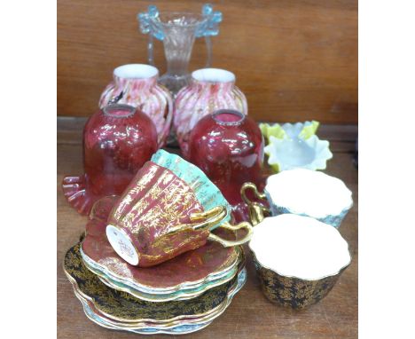 A pair of red glass shades, a pair of glass vases, a glass dish and a vase, and four Royal Stuart cups and saucers 