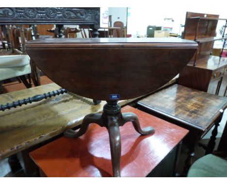 A 19th century mahogany dropleaf occasional table on tripod support. 25½' wide