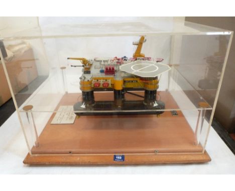A cased scale model of Uncle Ric, a diving support vehicle, the case 26' wide x 18' high. Made by Donald Smith, Kinlore, Aber