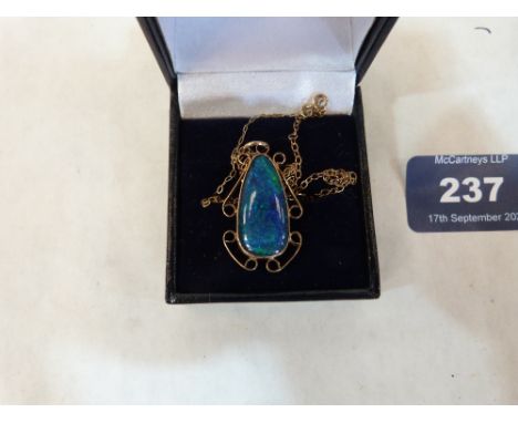 A gold opal set pendant on 9ct necklet chain. 3.7g gross