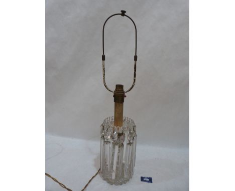 A cut glass lustre lamp base