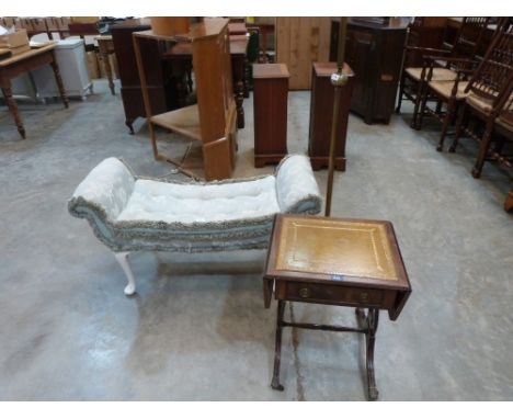 An upholstered window seat, a brass and onyx lamp standard and a dropleaf occasional table