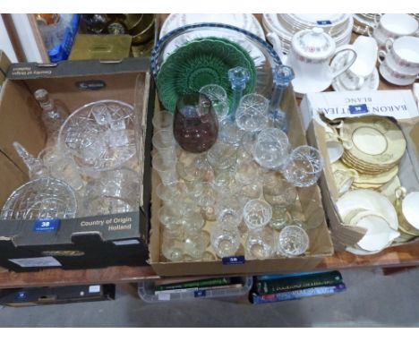 A part tea service, glassware and two green plates