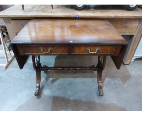 A mahogany sofa table of recent manufacture