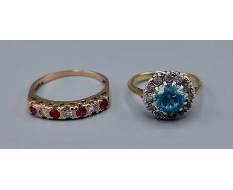 A 9ct gold Garnet and diamond band ring together with a 9ct gold cluster ring, 4.8 grams 