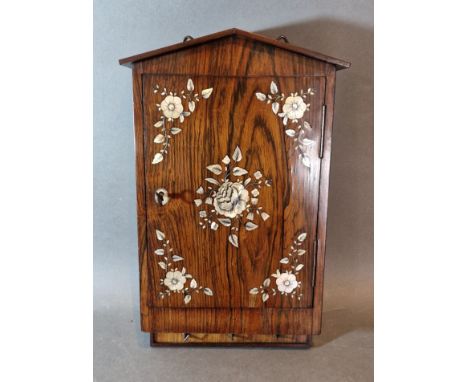 A Rosewood and Mother Of Pearl inlaid key box, 37cms x 21cms 