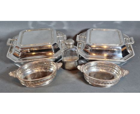 A London silver mounted and glass hip flask together with a pair of silver plated entree dishes and a pair of silver plated d