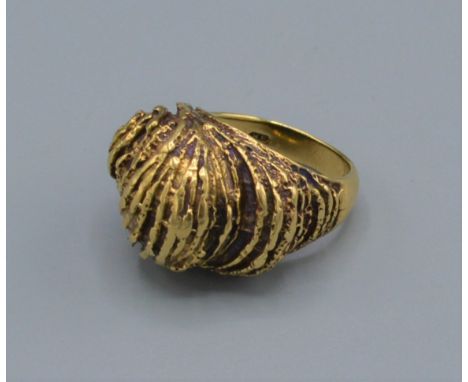 A 9ct gold heavy ring of scroll form, 12.2 grams, ring size M 