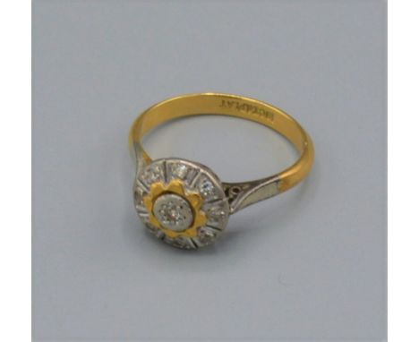 An 18ct gold diamond cluster ring, 3.3 grams, ring size K 