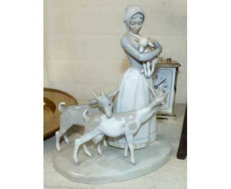 A Lladro figure group of country girl with goats, 10"