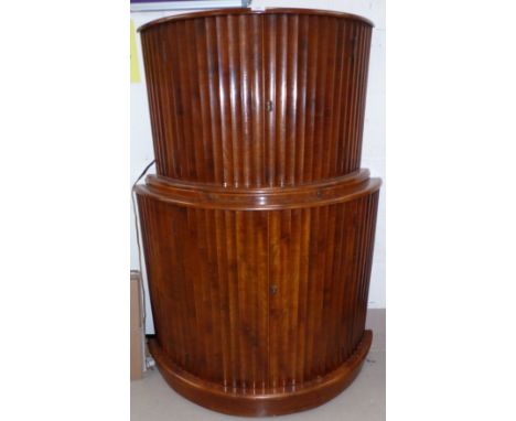 A 1930's ribbed walnut demi-lune cocktail cabinet by Rivington