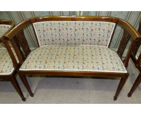 An Edwardian inlaid mahogany tub shaped 3 piece drawing room suite with pierced splats, square top legs and floral tapestry u