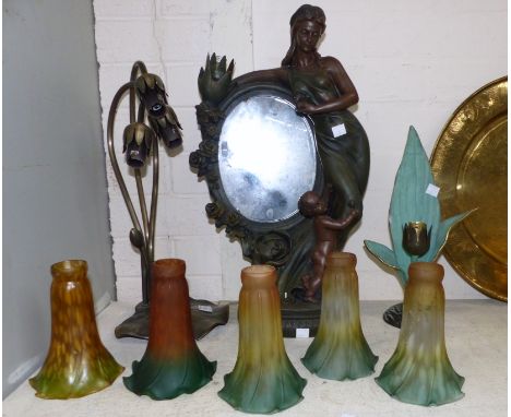 A figural table lamp and other light fittings