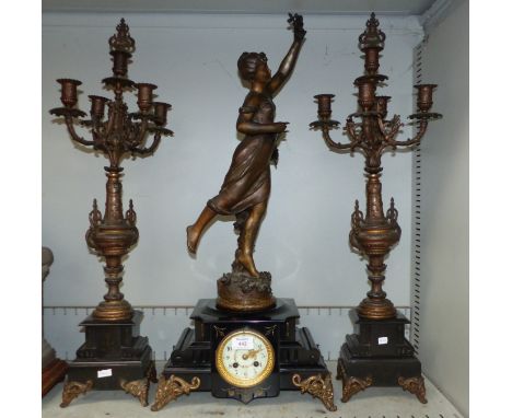 A 19th century black marble and bronzed spelter 3 piece clock garniture, the central clock with female figure "Papillon par K