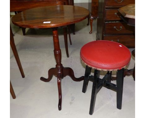 A circular early 19th century mahogany pedestal occasional table; a 1960's bar stool