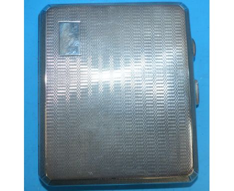 An engine turned rectangular cigarette case, Birmingham 1945, 4½ oz.