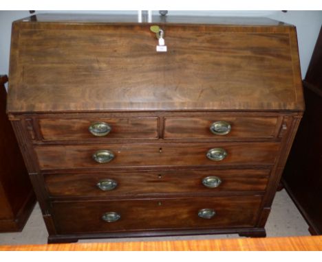 A mid Georgian mahogany bureau fitted 2 short and 3 long graduated drawers, on ogee bracket feet, 44"