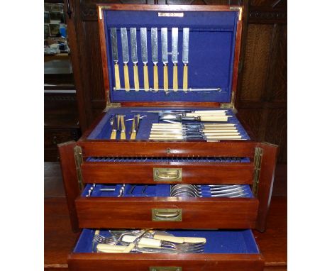 A 1920's EPNS canteen of cutlery in mahogany case with rising lid and fitted 3 drawers