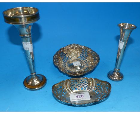 Two pressed and pierced silver sweetmeat dishes; a silver and guilloché enamel stem vase; and another