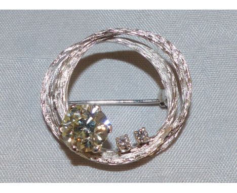 A modern white metal double circle brooch set large diamond, 2.4 carats , j - k colour, VS 1 - 2 clarity, old brilliant cut a