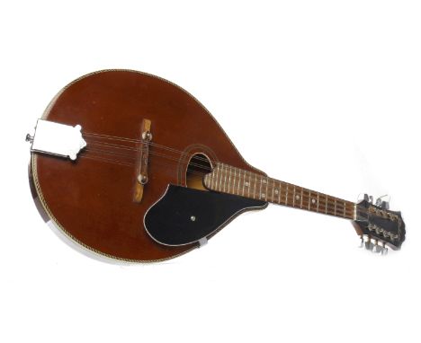 MODERN FLAT BACK MANDOLIN BY ANTORIAwith eight strings, mother of pearl inlay to fret board, with scratchboard, approximately