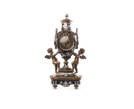 20TH CENTURY GILT METAL AND PORCELAIN MANTEL CLOCKthe bronzed face with Roman numerals, running on a quartz movement, the cer