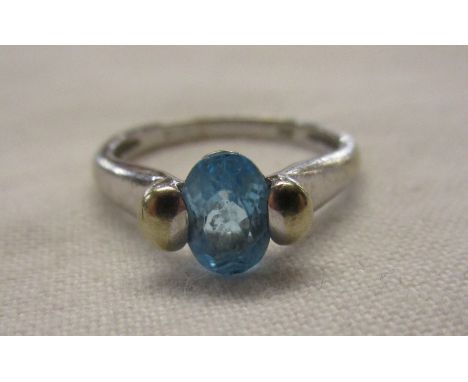 White gold blue stone set ring