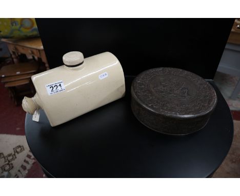 Ceramic hot water bottle and interesting biscuit tin