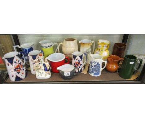 Shelf of ceramic jugs
