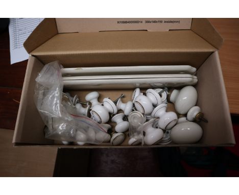 Box of ceramic door knobs etc