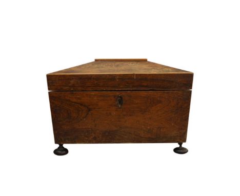 the&nbsp;sarcophagus shaped caddy with lift top opening to reveal a fitted interior&nbsp;